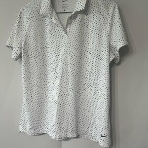NIKE Golf polo.